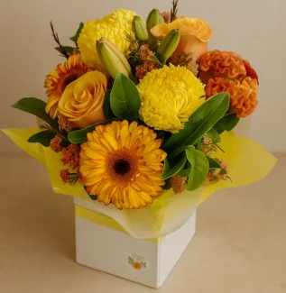 Bright flower arrangement Gold Coast with vibrant yellow flowers in a cheerful floral design