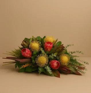 Australian native coffin spray with banksias and proteas funeral flowers Gold Coast delivery