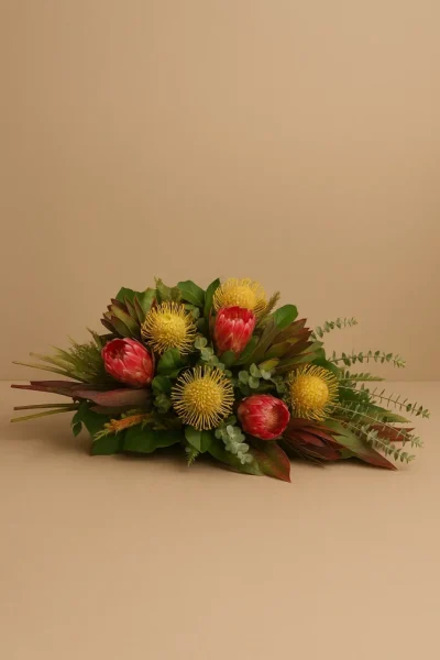 Australian native coffin spray with banksias and proteas funeral flowers Gold Coast delivery
