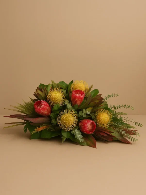 Australian native coffin spray with banksias and proteas funeral flowers Gold Coast delivery