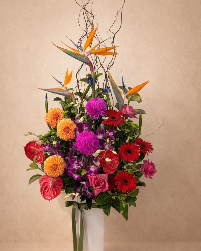 Tropical flower arrangement with exotic blooms and greenery in modern style Gold Coast