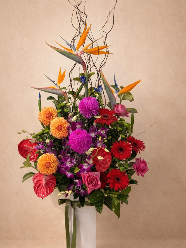 Tropical flower arrangement with exotic blooms and greenery in modern style Gold Coast