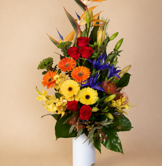 Tropical flower arrangement with exotic blooms and greenery in modern style Gold Coast
