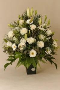 White flower bouquet with lilies roses and gerberas arranged in a modern box for delivery in Gold Coast