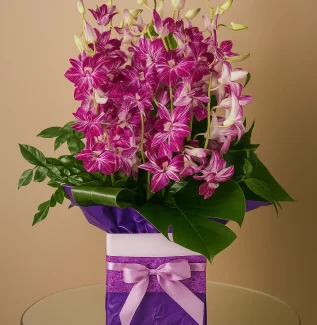 pink orchid arrangement Heavenly Hues Florist GC