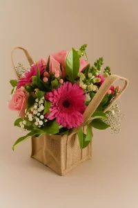 Pink seasonal flower arrangement Gold Coast featuring fresh mixed blooms in soft pink tones, beautifully styled and perfect for gifting