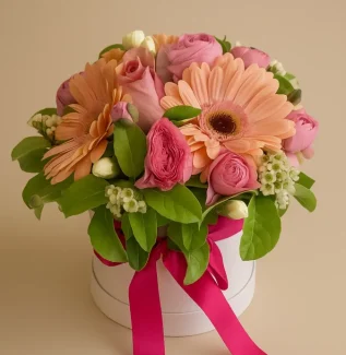 Peach and pink flower arrangement with gerberas and roses in white box Gold Coast