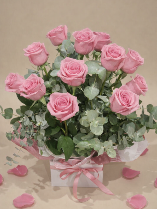 Luxury gift box with 12 pink roses elegant celebration arrangement perfect for special occasions