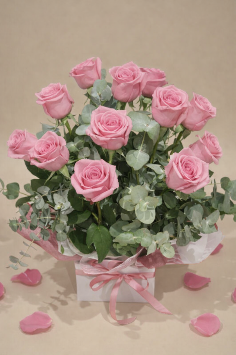 Luxury gift box with 12 pink roses elegant celebration arrangement perfect for special occasions