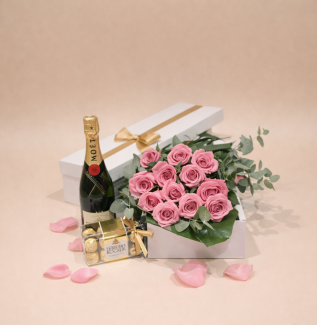 Elegant gift set with pink roses, champagne and Ferrero Rocher chocolates perfect for delivery on the Gold Coast
