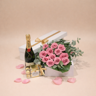 Elegant gift set with pink roses, champagne and Ferrero Rocher chocolates perfect for delivery on the Gold Coast