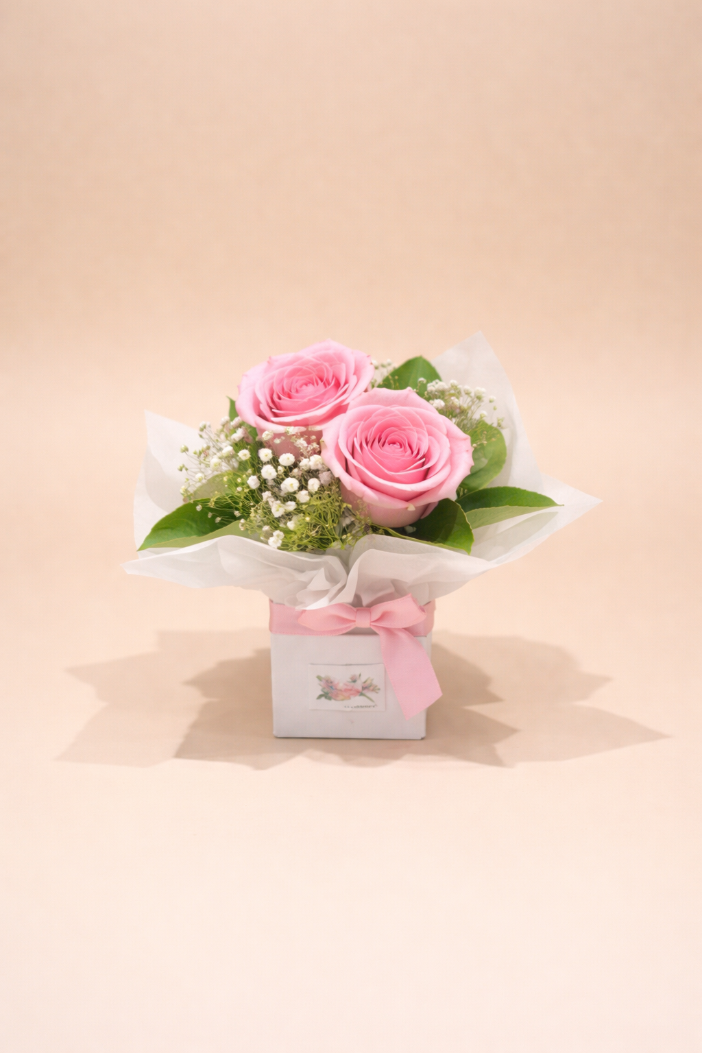 Two pink roses mini arrangement with baby’s breath in a small box – romantic flower gift Gold Coast delivery