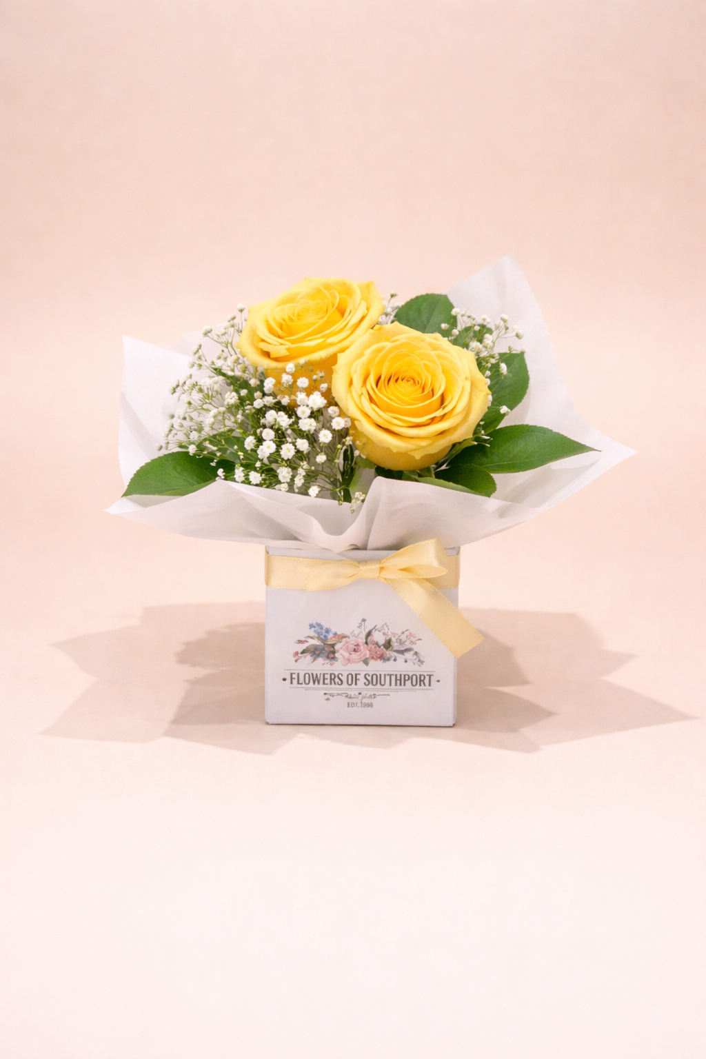 Two yellow roses mini arrangement with baby’s breath in a small box – romantic flower gift Gold Coast delivery