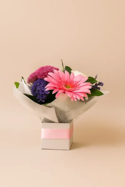 Small seasonal flower arrangement in a box with fresh mixed blooms, perfect for gifting on the Gold Coast