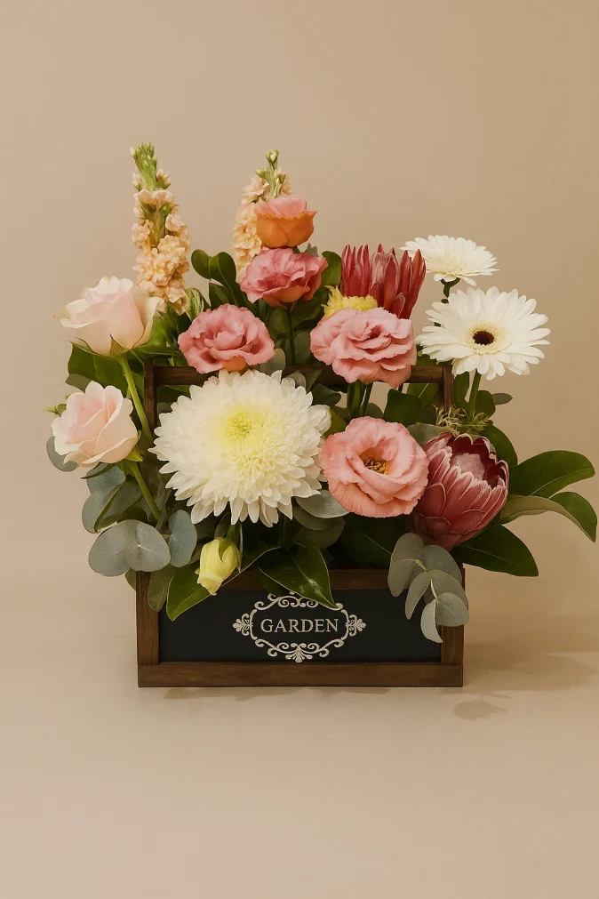 pastel flower arrangement in wooden box – Flowers of Southport