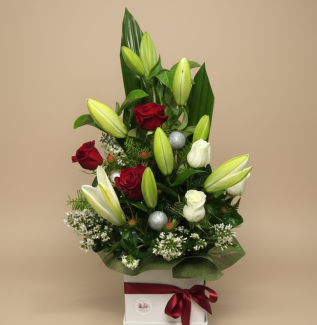 Custom Christmas flower arrangement in festive boxed style – florist’s choice by Flowers of Southport