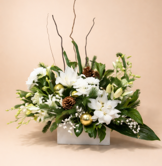 White and green flower arrangement Gold Coast with seasonal blooms in an elegant natural style