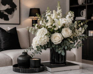 Elegant monochrome black and white floral arrangement styled in a modern living room - Flowers of Southport Gold Coast