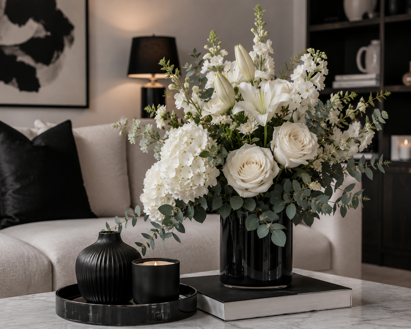 Elegant monochrome black and white floral arrangement styled in a modern living room - Flowers of Southport Gold Coast