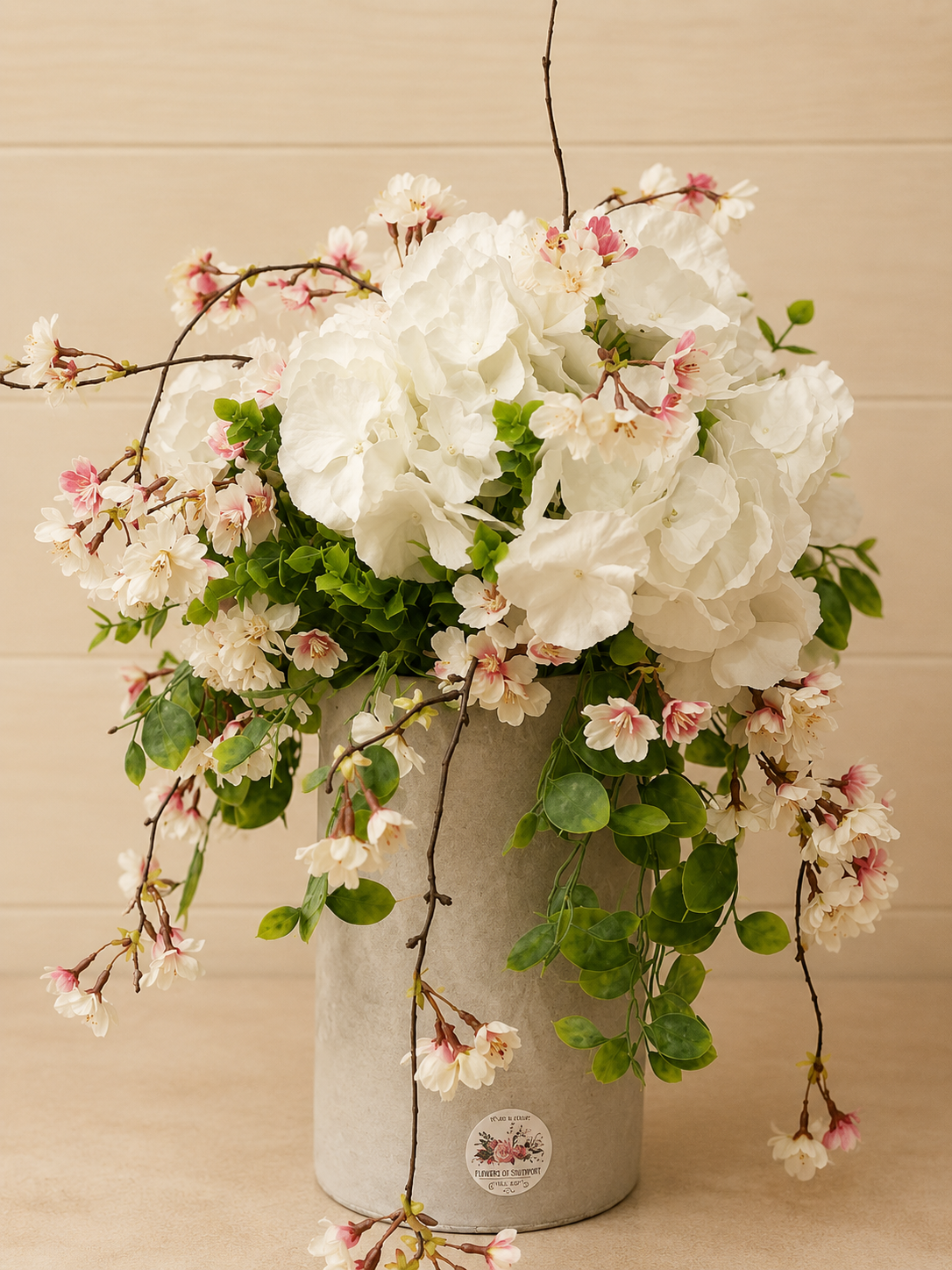 Monteclaro artificial flower arrangement - white hydrangeas with cascading pink cherry blossom in a tall stone vase, Flowers of Southport Gold Coast